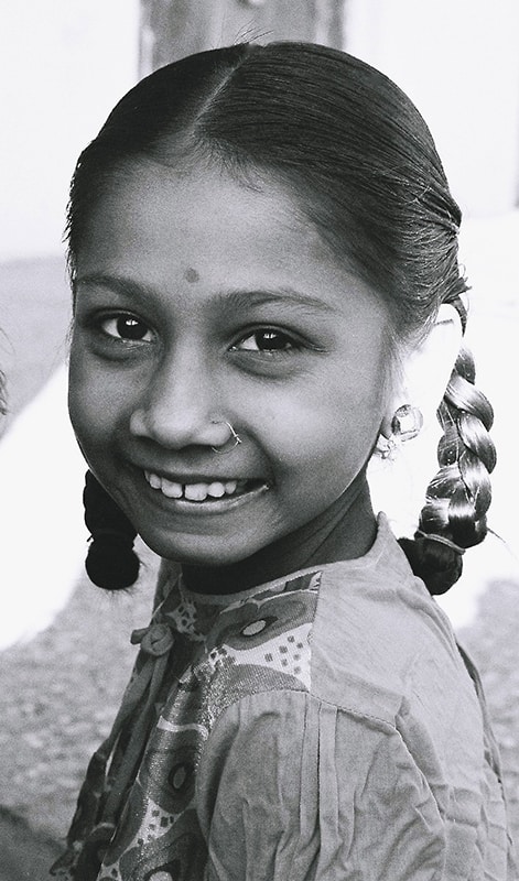 Smiling child at Swami Kripalvananda's (Swami Kripalu's) 60th Birthday celebration in the villages of Rajpipla and Umalla – January 13, 1974