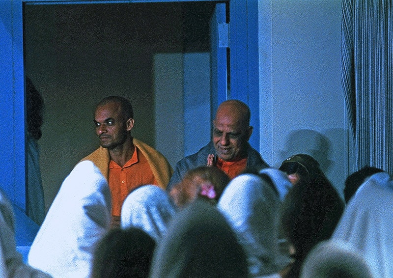 Swami Kripalvananda's (Swami Kripalu's) arrival in America at JFK Airport. With Swami Vinit Muni (on left). May 20, 1977.
