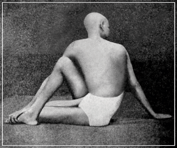 Swami Kripalvananda (Swami Kripalu) in Matsyendrasana pose.